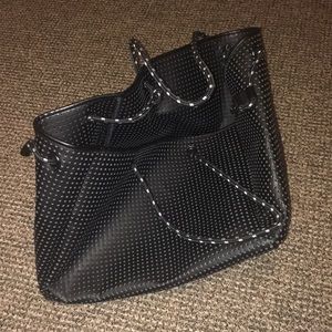Black and white perforated travel or beach bag